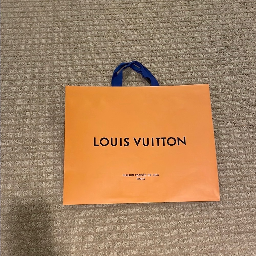 Louis Vuitton Bold Orange Bag with Blue Handles